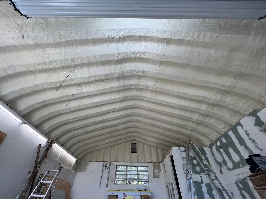 Spray polyurethane foam applied to the underside of a metal roof deck in Fruit Heights